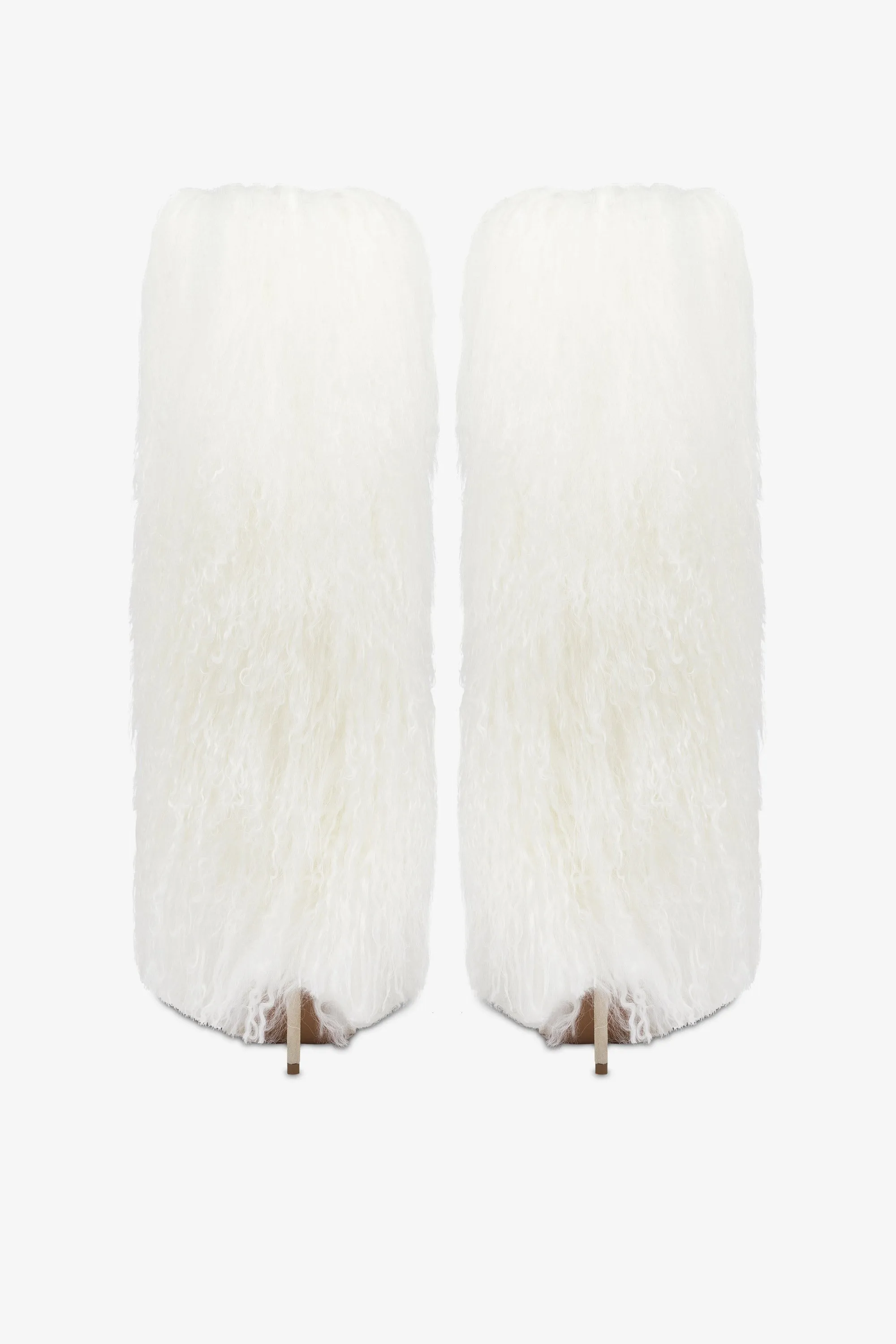 Boots in suede and white mongolian fur