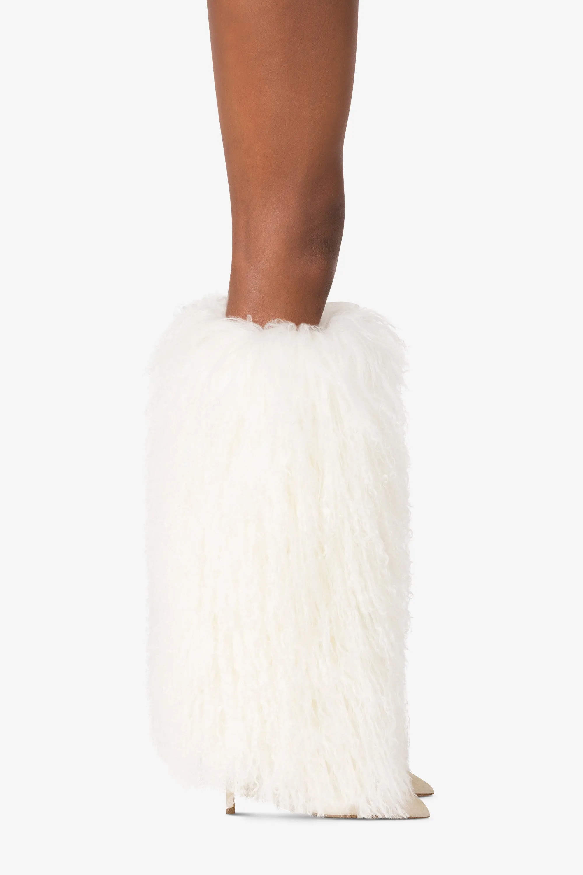 Boots in suede and white mongolian fur