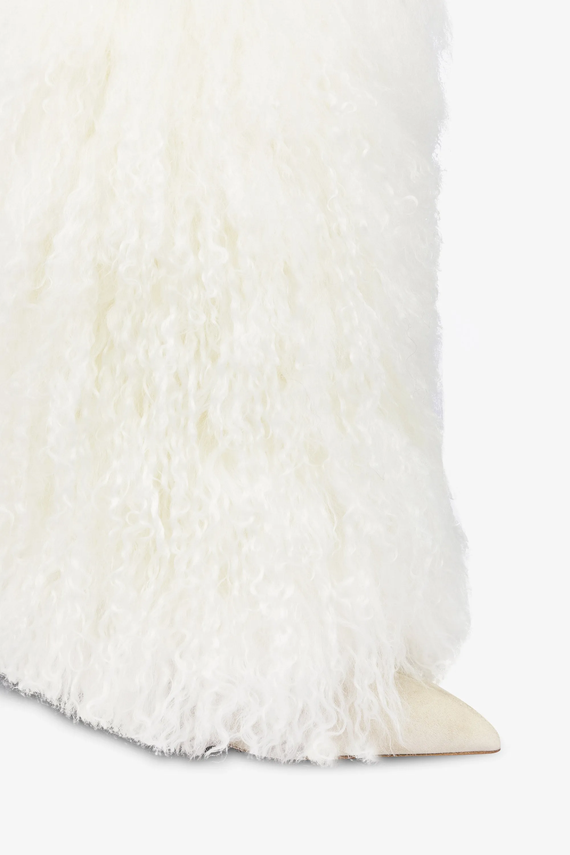 Boots in suede and white mongolian fur