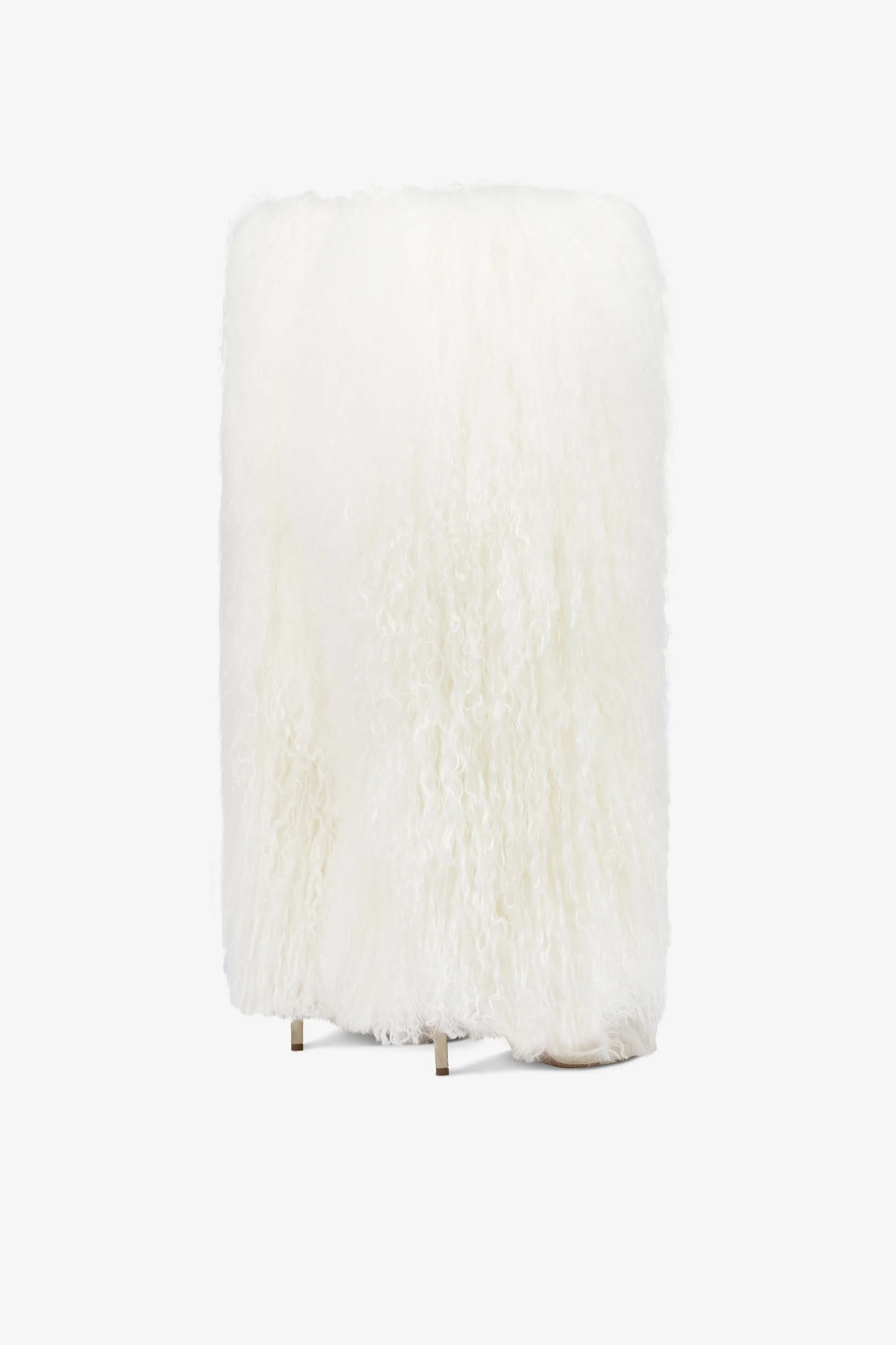 Boots in suede and white mongolian fur