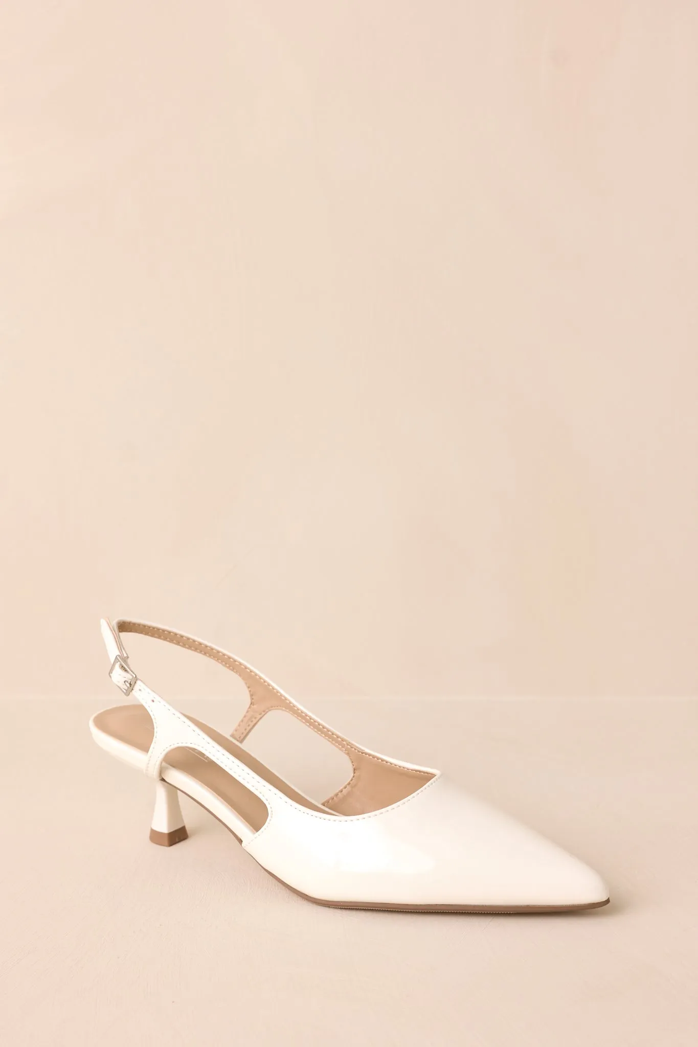 Fiercely Stunned White Patent Kitten Heels