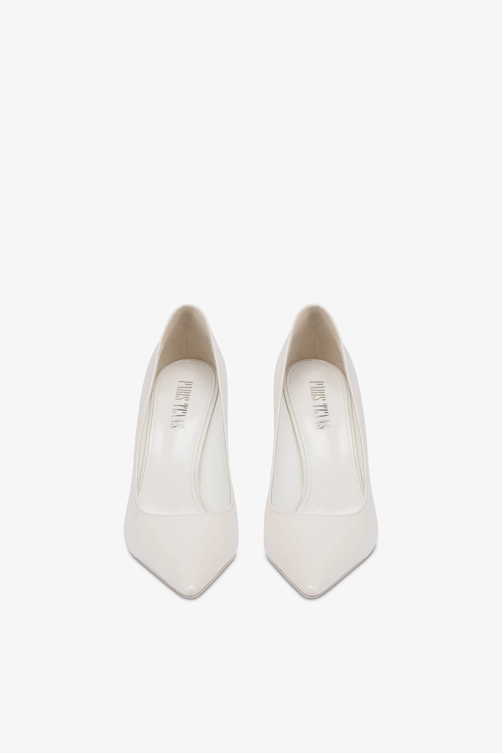 Pumps in white patent leather